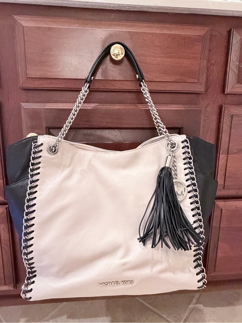 Michael Kors Two-Tone Leather Tote in Cream and Black with Tassel